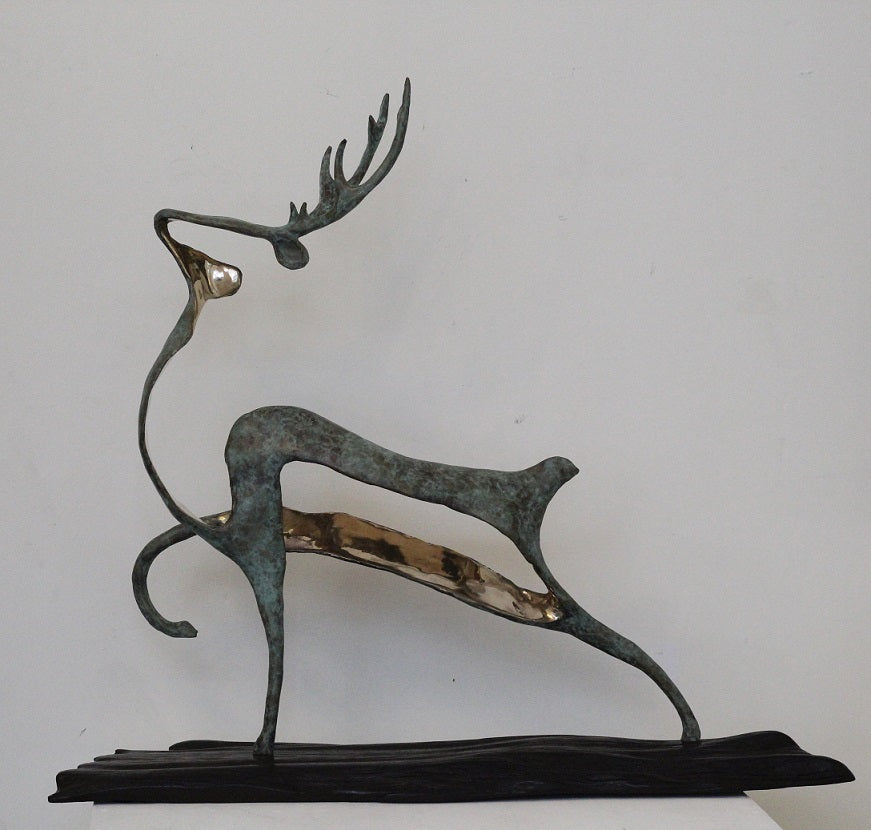 Stag , bronze on bog oak by Ani Mollereau